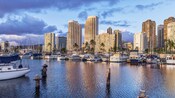 The waterfront of a large city with tall buildings