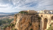 The mountaintop city of Ronda sits above the dramatic Tajo gorge overlooking Andalusia
