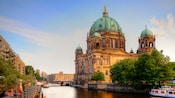 Domed building overlooks a placid canal