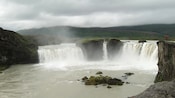 The spectacular Godafoss waterfalls under a stormy sky