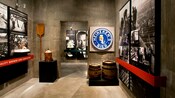 The industrial concrete interior of the Heineken Museum reveals a series of artifacts and photographs tracing the history of beer making