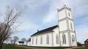 Exterior of a building featuring symbols of the cross