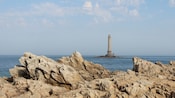 A lighthouse in the middle of the ocean