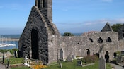 The stone ruins of a church by the sea
