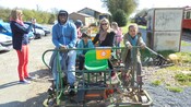 Smiling passengers on an eco-friendly rail cycle
