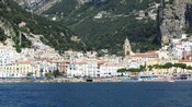 The buildings and hills of Amalfi along the coastline