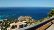 A town and several boats in the distance