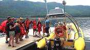 Guests boarding a boat on Cape Trinity
