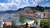 The buildings, streets, hills and coast of Baiona