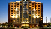 The front of the 14-story Embassy Suites Anaheim - South lit up at night