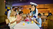 Host Chef Goofy joins a girl's family to help celebrate her birthday at Goofy's Kitchen