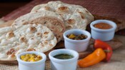 Indian-style bread service with 4 dipping sauces