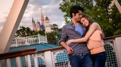 A couple hug each other while riding on the Liberty Belle riverboat in Liberty Square