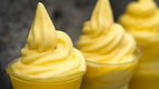 Three cups filled with soft-serve Dole Whip at the Epcot International Flower & Garden Festival