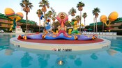 Statues of The Three Caballeros - Donald Duck, José Carioca and Panchito - stand in the center of the guitar-shaped Calypso Pool