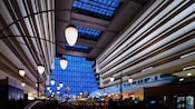 The main concourse of Disney's Contemporary Resort with the monorail zooming by
