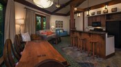 The kitchen, dining area and living area of a Treehouse Villa