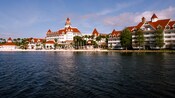 A midday view of Disney’s Grand Floridian Resort & Spa from Seven Seas Lagoon