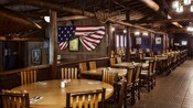 Dining area with an Old West theme and a old American flag on the wall