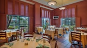 Airy dining area set for breakfast in Fresh Mediterranean Market at Walt Disney World Dolphin Resort