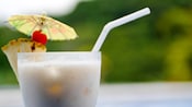 Close-up of a pina colada with umbrella