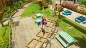 Two Guests climbing across hanging platforms in a challenge course