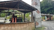 A trapiche and other sugarcane processing equipment on the grounds of a Puerto Rican hacienda