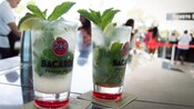 2 Mojitos served in a glass with a logo that reads ‘Bacardi Puerto Rico’