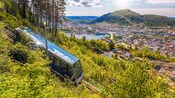 The Fløibanen funicular ascending a section of Mount Fløyen with panoramic views of Bergen, Norway