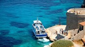 A passenger ferry docked at Château d’If in Marseille, France