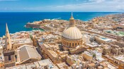 The city of Valletta, Malta featuring the Basilica of Our Lady of Mount Carmel, Saint Paul’s Anglican Pro Cathedral and Fort Saint Elmo