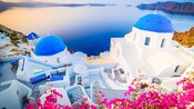 Domed buildings overlooking the Aegean Sea in Santorini