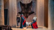 Two Huna Tlingit clan members engaged in a cultural performance