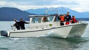 A group of Guests on a fishing boat enjoying a tour in Alaskan waters