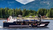 The Aleutian Ballad crab fishing ship sailing along the Alaskan coast
