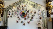 A wall display of various perfume ingredients along with informative displays about each ingredient
