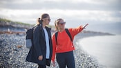 Two women admiring the views of Kapiti Coast in Wellington, New Zealand