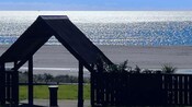 A Māori shelter near a beach at the Bay of Plenty
