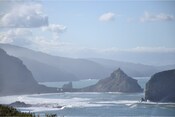 San Juan de Gaztelugatxe, an islet on the coast of Biscay, connected to the mainland by a two-arched bridge