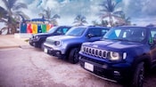 A row of Jeeps in a parking lot in Costa Maya, Mexico
