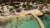 Islands Beach Club with a private pool, beach loungers and umbrellas on a beach in Cozumel, Mexico