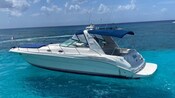Small sport boat in the middle of the ocean