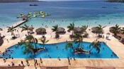 A swimming pool along Puerto Seco Beach overlooking the Caribbean Sea