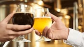 Two glasses raised for a toast
