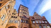 Medieval row buildings with arched entrances
