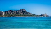 A volcanic mountain range next to the ocean