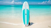 A paddleboard standing upright by the shore with a paddle leaning next to it