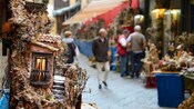 A small decorative housefront model, for sale in a street market