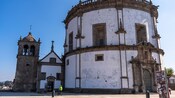 The Serra do Pilar Monastery, a circular building with ornate parapets and a small cupola