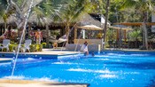 A group of people relax in a pool in Puerto Vallarta